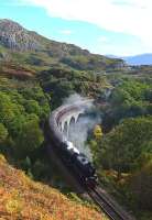 62005 crosses Arnabol Viaduct with <I>The Jacobite</I> on 1 October. This viaduct is not so well known as Loch nan Uamh about half a mile away. The picture would not have been possible a few years ago as the embankment was very overgrown but a firehas cleared it.<br><br>[John Gray 01/10/2013]