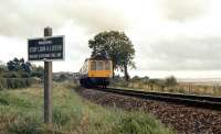 A DMU from Exemouth runs north towards Exeter alongside the estuary in 1985.<br><br>[Ian Dinmore //1985]