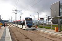 Scene at Edinburgh Park interchange on 8 October 2013, during the first day of the trial running of trams between Gogar depot and Edinburgh Park.<br><br>[Bill Roberton 08/10/2013]