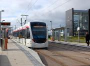 Tram trials in progress on 8 October at Edinburgh Park interchange.<br><br>[Bill Roberton 08/10/2013]