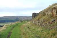 The 11 mile freight-only Rosedale Branch, opened in 1861, ran from Battersby Junction across the heights of the North York Moors to reach iron ore deposits in the Rosedale valley. Part of the trackbed in the vicinity of the kilns is seen here in October 2013, some 84 years after the line closed.<br><br>[Peter Todd 06/10/2013]