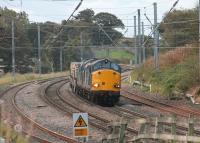 The morning Crewe to Sellafield flask train rounds the reverse curves at Oubeck Loops on 9 October. 37609 and 37419 had four flask wagons heading for the Cumbrian Coast. <br><br>[Mark Bartlett 09/10/2013]