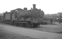 J17 0-6-0 65567 awaiting its fate at Doncaster Works on 7 October 1962. The locomotive had been withdrawn from March shed 2 months earlier. This story had a happy ending! [See image 37158]<br><br>[K A Gray 07/10/1962]