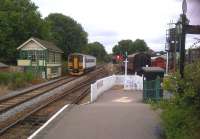 How it might have been: the 17.07 to Sudbury heads north by north-east, surrounded by a pleasant clutter of preserved items. Despite appearances, the signal box is out of use. [see image 37953]<br><br>[Ken Strachan 20/07/2013]