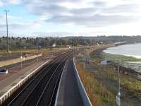 View south from the footbridge at Montrose station on a late afternoon in October 2013. The gradient over the South Esk viaduct is clearly apparent in the background. Montrose Basin is on the right.<br><br>[Andrew Wilson 10/10/2013]