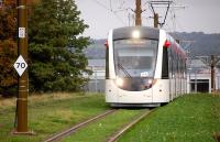 Tram 266 approaches the Gogarburn stop during testing on 14 October with the depot in the background.<br><br>[Bill Roberton 14/10/2013]