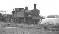 GWR Collett 0-4-2T 1474 photographed at Southall in August 1961. The locomotive was eventually withdrawn from Gloucester Horton Road in September 1964.<br><br>[K A Gray 20/08/1961]