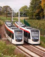 Trams 265 and 277 pass near Gogar depot on 14 October.<br><br>[Bill Roberton 14/10/2013]