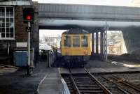 A DMU off the Exmouth branch leaves Exeter Central for St Davids in the 1980s. <br><br>[Ian Dinmore //1984]