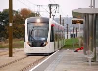 Edinburgh Tram 258 enters the Gogarburn stop westbound on 14 October 2013.<br><br>[Bill Roberton 14/10/2013]