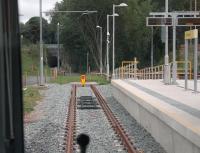 <I>Temporary terminus?</I> Although there are no funds at present to extend the Metrolink system beyond East Didsbury there are hopes that it will eventually reach Stockport and East Didsbury (Metrolink) has been designed to facilitate this. Until 1969 this was the  mainline from Manchester Central to St. Pancras and the Midland Pullman diesel units hurried past this point.<br><br>[Mark Bartlett 31/07/2013]