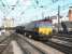 A coal train about to pass Newcastle Central westbound in July 2004 behind EWS 66229.  <br><br>[John Furnevel 06/07/2004]