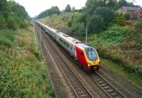 A pair of Voyagers heading south between Boar's Head Junction and Wigan North Western on 2 October 2013.<br><br>[John McIntyre 02/10/2013]