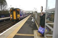 One of the four passengers at Gretna Green on 18 October awaiting the arrival of the 1323 service to Glasgow Central (which was very well loaded).<br><br>[Bruce McCartney 18/10/2013]