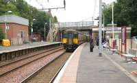 A train for Dalmuir runs into Hamilton West in the summer of 2006.<br><br>[John Furnevel 01/08/2006]