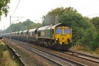 A loaded coal train from Hunterston to Fiddler's Ferry Power Station hauled by Freightliner 66603 seen on 2 October 2013 towards the end of its journey near Standish in Lancashire.<br><br>[John McIntyre 02/10/2013]