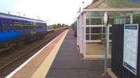 A Glasgow Central - Carlisle DMU about to pass a reverse working at Gretna Green on 20 October 2013.<br><br>[Bruce McCartney 20/10/2013]