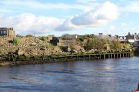 View upriver on 24 October showing, on the north bank of the river, the site of the coal chutes from which rail wagons were unloaded into ships, There were sidings here reached via Girvan Goods. [See image 24815]<br><br>[Colin Miller 24/10/2013]
