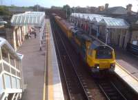 Freightliner 70013 rumbles north through Loughborough station on 25 October, hauling a trainload of stone from Barrow-on-Soar. <br><br>[Ken Strachan 25/10/2013]