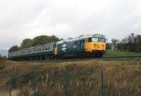 EE Class 50 No. 50015 <I>Valiant</I> passes Burrs Country Park, between Summerseat and Bury, with an ELR Rawtenstall to Heywood service on 26 October 2013.<br><br>[Mark Bartlett 26/10/2013]