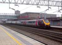 The 11.25 to Bournemouth, comprising a single Voyager set, pulls out of Stafford (platform 1) on 2nd October.<br><br>[Ken Strachan 02/10/2013]