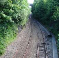 View south from Albany Street on 17 June 2013, showing the Oban approach lines. The main line is to the left, with the former goods and carriage sidings on the right (now used for charter train refuge). Far right is a walkway installed by Network Rail for use by crews to lock the lever frame when an outward bound charter departs from platform 4. [With thanks to Doug Carmichael]<br><br>[David Pesterfield 17/06/2013]