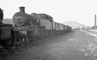 Stanier 3P 2-6-2T no 40122 stands in a line of stored steam locomotives in a siding at Llandudno Junction shed in April 1963, approximately 10 months after withdrawal.<br><br>[K A Gray 01/04/1963]