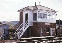 The signal box at Stoke Canon Crossing, north east of Exeter, photographed in July 1984. Closed the following year, the listed structure still stands. [With thanks to Prestonian, Kenneth Leiper and Eric Gains]<br><br>[Ian Dinmore /07/1984]