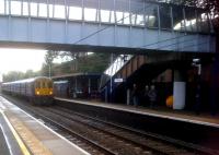 An up EMU coasting to a halt approaching the unusual canted glass footbridge at Radlett on 13 October 2013. The weather was distinctly dreich.<br><br>[Ken Strachan 13/10/2013]