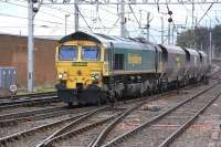 Freightliner 66566 enters Carlisle from the Tyne Valley line on 11 October with the York - New Cumnock empties.<br><br>[Bill Roberton 11/10/2013]