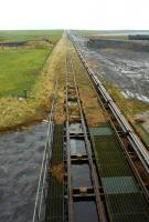 Looking west over the McKelvie Hydraulic Lifting Bridge, near Keiss, Caithness, in the 1990s [see image 43558].<br><br>[Ewan Crawford //]