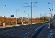 Gyle Centre tram stop catching the afternoon sunshine on 10 November 2013. <br><br>[Bill Roberton 10/11/2013]