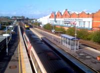 A class 222 heading North meets an HST heading South at Loughborough Midland on 25th October. Not much sign of the goods yard now [see image 30501].<br><br>[Ken Strachan 25/10/2013]