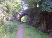 To the north of the picnic table at Beetham [see image 44918], there's a cool, shaded cutting featuring a nice stone bridge. View looks North-East towards Sandside village.<br><br>[Ken Strachan 29/07/2013]