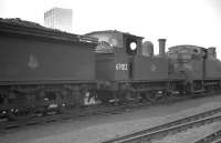 J72 0-6-0T 69012 stands in the sidings at Thornton Junction in the late 1950s. Standing beyond is N15 0-6-2T 69132. One of the towers of Rothes Colliery can be seen in the background.<br><br>[K A Gray //]