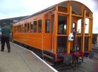 Litmus test: your personality and knowledge will determine your reaction to this picture. You may say 'Goodness me, that's Henrietta, friend of Thomas'; or perhaps 'what a nice replica Wisbech and Upwell Tramway coach'; or if very well informed, 'what HAVE they done to that ferryvan?' (on which this reproduction was based)<br><br>[Ken Strachan 20/07/2013]