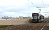 A cold and breezy November morning sees a near deserted promenade at Blackpool as <I>Flexity</I> 008 heads north towards the Central Pier near Manchester Square. The 10 minute interval service between Starr Gate and Fleetwood is maintained until the illuminations close but supplemented by shorter workings on the central section at busy periods. <br><br>[Mark Bartlett 13/11/2013]
