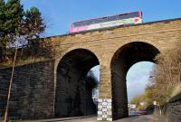 A 22 bus crossing the converted railway viaduct over Russell Road in November 2013. The former Caledonian route from Dalry Middle Junction to Haymarket West Junction closed in 1964.<br><br>[Bill Roberton 16/11/2013]