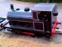 Good job they left the handbrake on. This 0-4-0 saddle tank, with a few bits missing, seems to be content to be a 'gate guardian' at the East Anglian Railway Museum on 20th July.<br><br>[Ken Strachan 20/07/2013]