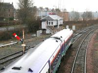 A train for Dunblane about to pass Stirling North box in January 2005, shortly after restarting from Stirling station.<br><br>[John Furnevel 22/01/2005]