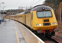 Network Rail's New Measurement Train pauses at Carstairs on its way from Glasgow Central to Craigentinny Depot on a wet 26 November 2013. <br><br>[Bill Roberton 26/11/2013]