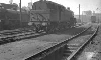 Stanier 2-6-4T 42578 in the yard at at 65C Parkhead shed in April 1961. View is west with the Parkhead Forge and associated works of William Beardmore & Sons forming the backdrop. The North Clyde line is just off picture to the right.<br><br>[K A Gray 03/04/1961]