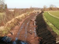 Waverley trackbed looking north from an unclassified road just west of the A7 at Arniston, between Newtongrange and Gorebridge, on 29 November 2013. The headgear of Lady Victoria Colliery is visible top right. <br><br>[John Furnevel 29/11/2013]