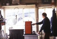 Signalman Mike Hayman at work in Cowley Bridge Junction signal box in June 1985 [see image 44796].<br><br>[Ian Dinmore /06/1985]