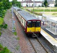 The 11.35 Paisley Canal - Glasgow Central calls at Hawkhead on 24 June 2013.<br><br>[Colin Miller 24/06/2013]