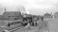 Crab 42737 makes a photostop at Larkhall East on 29 March 1964 with the SLS <I>Scottish Rambler no 3</I>. The special was on its way from Glasgow Central to Swinhill [see image 6965].<br><br>[John Robin 29/03/1964]