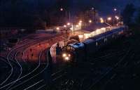 Southbound 37 hauled sleeper at Crianlarich in 1995. At the time the continued running of the sleeper was in doubt. A variant of this photograph appeared in John McGregor's book.<br><br>[Ewan Crawford //1995]