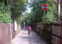 Rather greener than the average Tube station entrance - the Northern approach to High Barnet in summer 2013.<br><br>[Ken Strachan 12/07/2013]