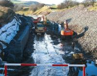 <I>Bring your own wellies!</I> View north along the Waverley trackbed at Borthwick on 1 December 2013.<br><br>[John Furnevel 01/12/2013]