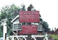 A memento of the GN&GE Joint line at Metheringham, between Lincoln and Sleaford, in 1979. Looking north from the level crossing towards Lincoln, with the signal box (known as Blankney) partially hidden by the sign.<br><br>[Ian Dinmore //1979]
